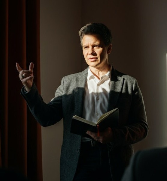 Smiling student using a laptop